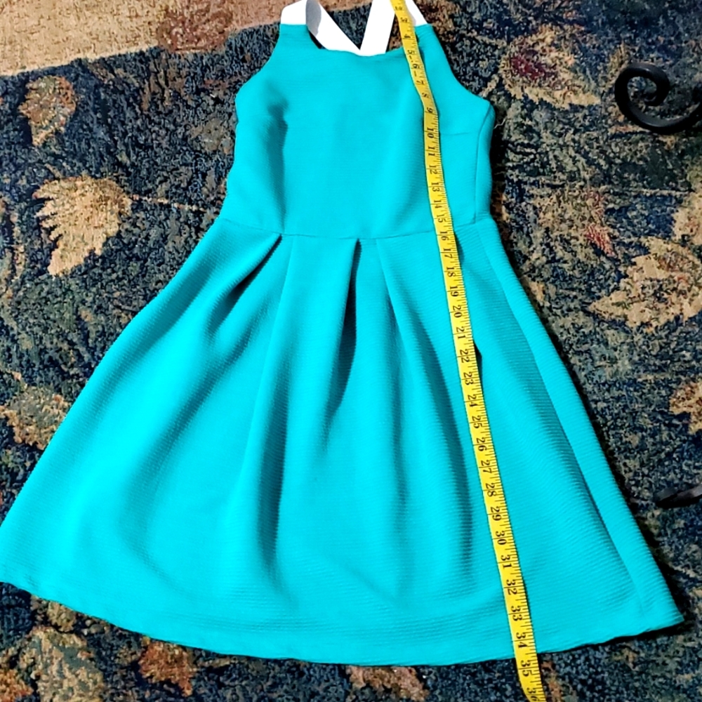 IT'S  Dress size S 96% Polyester 4% Spandex very good condition